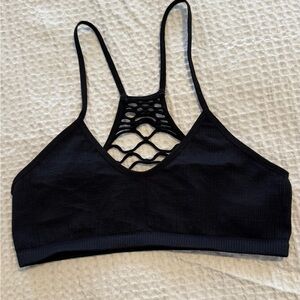 FP Movement Black Strappy Sports Bra. NWOT. 
Size M/L